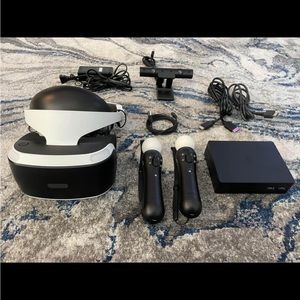 PlayStation 4 VR headset with all components.